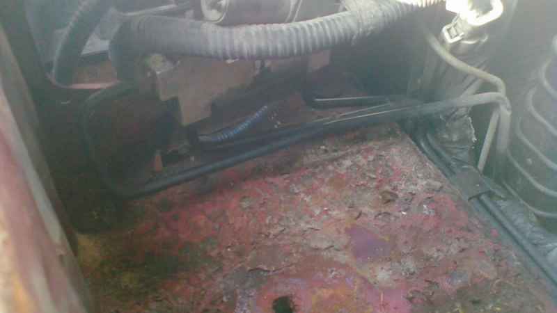 This is where the battery and its mounting tray sit. Just enough room to work a flaring tool.